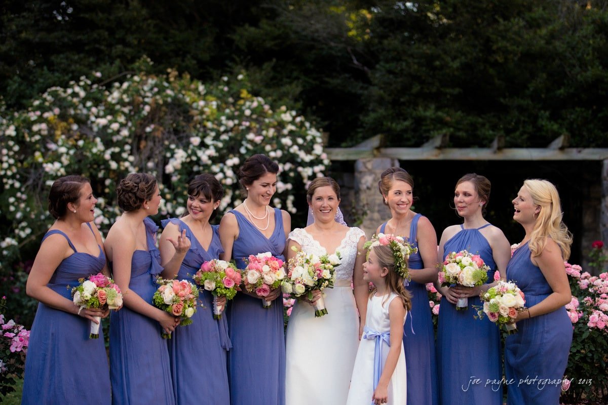 bridesmaids and bride at raleigh rose garden