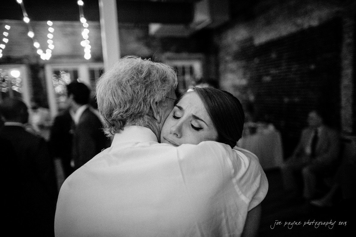 emotional embrace between dad and daughter