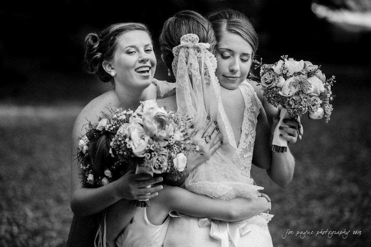 sisters congratulate the newlywed bride